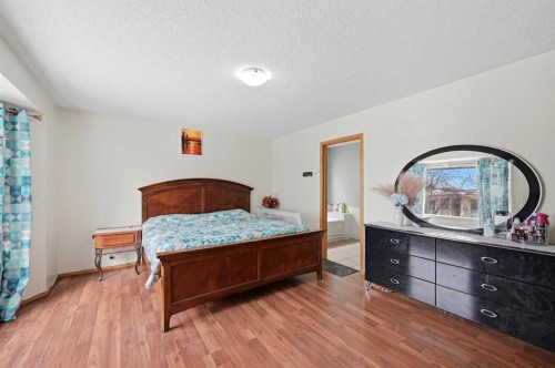 64 Eldorado Close Ne, Calgary, AB - Indoor Photo Showing Bedroom