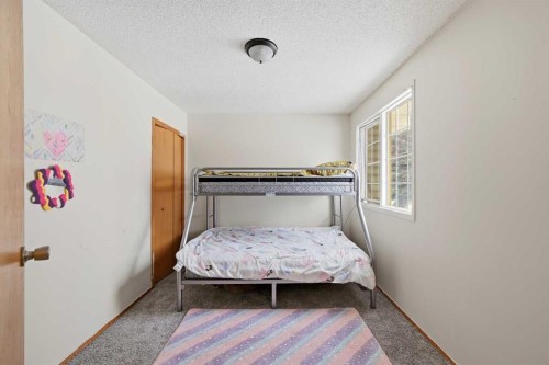 64 Eldorado Close Ne, Calgary, AB - Indoor Photo Showing Bedroom