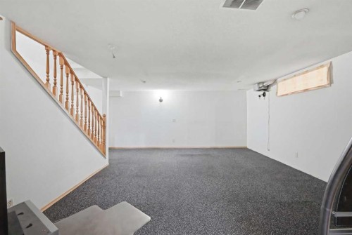 64 Eldorado Close Ne, Calgary, AB - Indoor Photo Showing Other Room