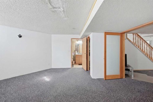 64 Eldorado Close Ne, Calgary, AB - Indoor Photo Showing Other Room