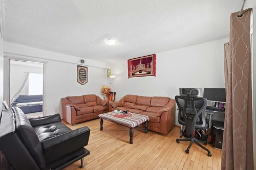 64 Eldorado Close Ne, Calgary, AB - Indoor Photo Showing Living Room