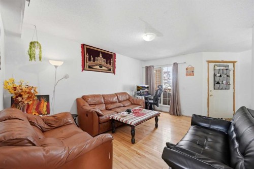 64 Eldorado Close Ne, Calgary, AB - Indoor Photo Showing Living Room