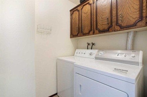 1133 Berkley Drive Nw, Calgary, AB - Indoor Photo Showing Laundry Room