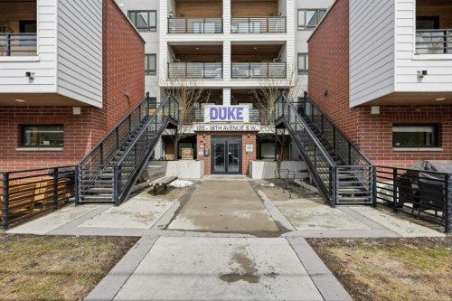 305-120 18 Avenue Sw, Calgary, AB - Outdoor With Balcony With Facade