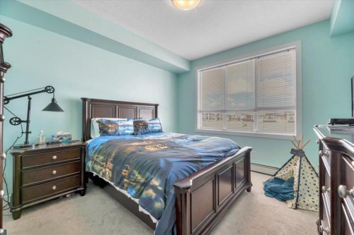 408-35 Walgrove Walk Se, Calgary, AB - Indoor Photo Showing Bedroom