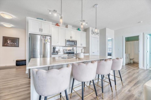 408-35 Walgrove Walk Se, Calgary, AB - Indoor Photo Showing Kitchen With Stainless Steel Kitchen With Double Sink With Upgraded Kitchen