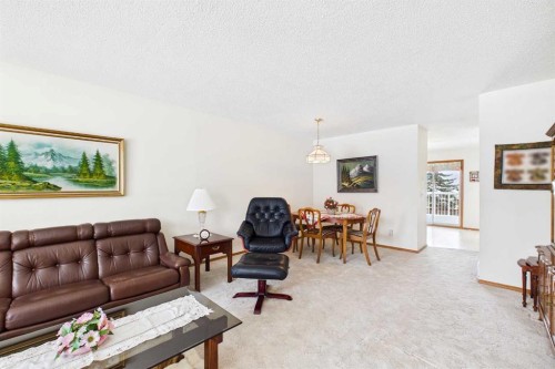 115 Macewan Park Heights Nw, Calgary, AB - Indoor Photo Showing Living Room