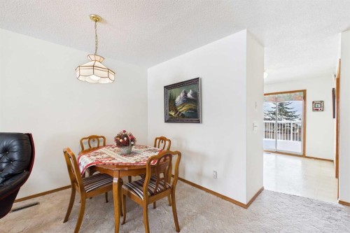 115 Macewan Park Heights Nw, Calgary, AB - Indoor Photo Showing Dining Room
