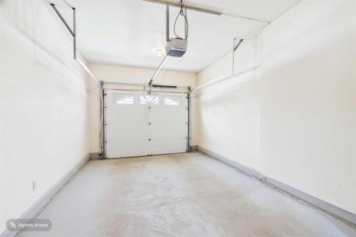 115 Macewan Park Heights Nw, Calgary, AB - Indoor Photo Showing Garage