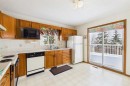 115 Macewan Park Heights Nw, Calgary, AB  - Indoor Photo Showing Kitchen With Double Sink 
