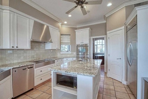 8 Mt Douglas Point Se, Calgary, AB - Indoor Photo Showing Kitchen With Upgraded Kitchen
