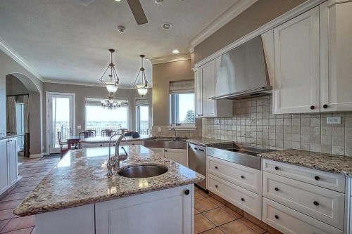8 Mt Douglas Point Se, Calgary, AB - Indoor Photo Showing Kitchen With Upgraded Kitchen