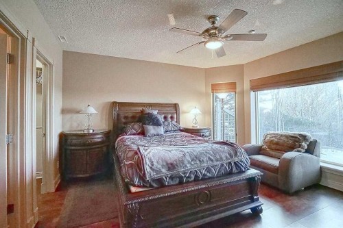 8 Mt Douglas Point Se, Calgary, AB - Indoor Photo Showing Bedroom