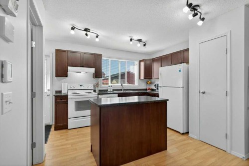 243 Redstone Drive Ne, Calgary, AB - Indoor Photo Showing Kitchen