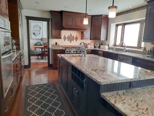 16021 Mckenzie Lake Way Se, Calgary, AB - Indoor Photo Showing Kitchen With Upgraded Kitchen