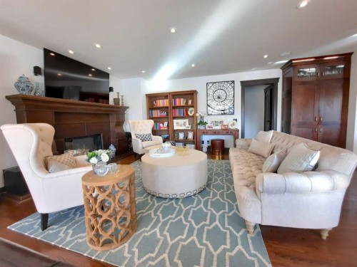 16021 Mckenzie Lake Way Se, Calgary, AB - Indoor Photo Showing Living Room With Fireplace