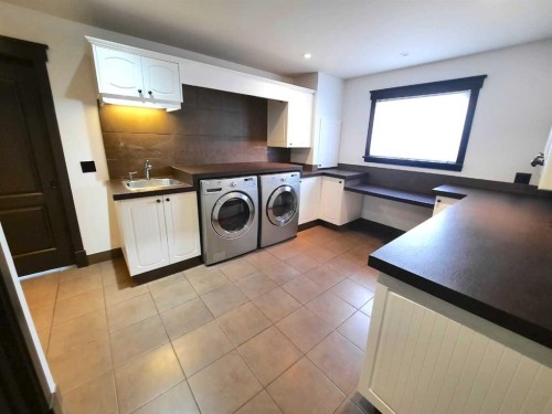 16021 Mckenzie Lake Way Se, Calgary, AB - Indoor Photo Showing Laundry Room