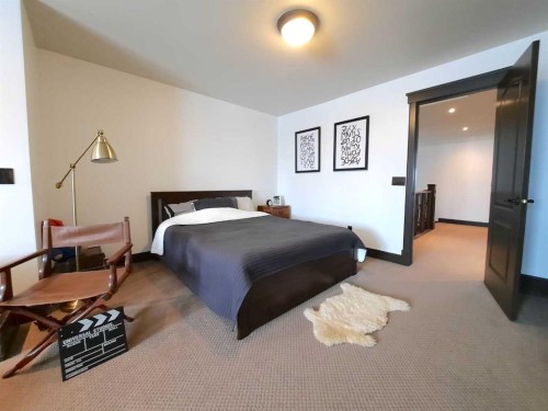 16021 Mckenzie Lake Way Se, Calgary, AB - Indoor Photo Showing Bedroom