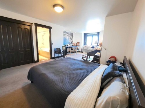 16021 Mckenzie Lake Way Se, Calgary, AB - Indoor Photo Showing Bedroom