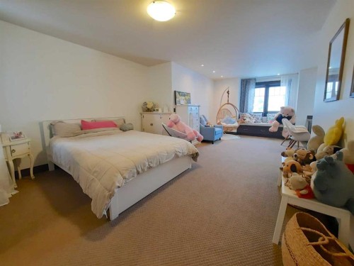 16021 Mckenzie Lake Way Se, Calgary, AB - Indoor Photo Showing Bedroom