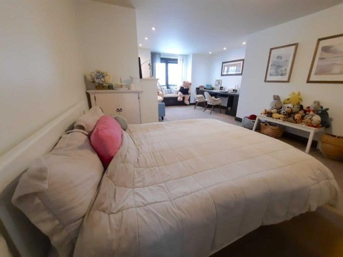 16021 Mckenzie Lake Way Se, Calgary, AB - Indoor Photo Showing Bedroom