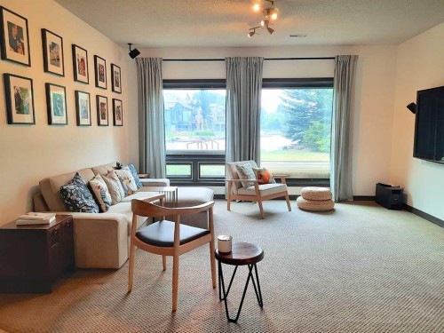 16021 Mckenzie Lake Way Se, Calgary, AB - Indoor Photo Showing Living Room