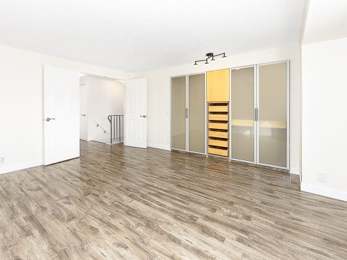 84 Queen Anne Close Se, Calgary, AB - Indoor Photo Showing Other Room