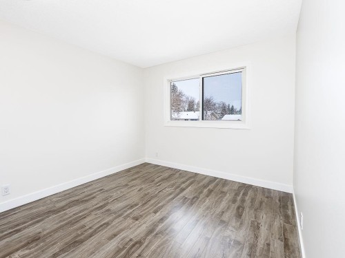 84 Queen Anne Close Se, Calgary, AB - Indoor Photo Showing Other Room