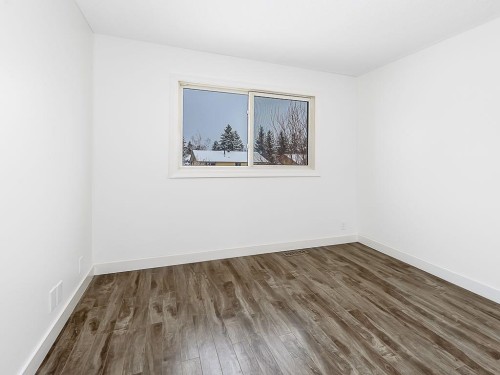 84 Queen Anne Close Se, Calgary, AB - Indoor Photo Showing Other Room