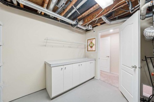 59 Sunlake Close Se, Calgary, AB - Indoor Photo Showing Basement