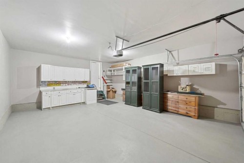 59 Sunlake Close Se, Calgary, AB - Indoor Photo Showing Garage