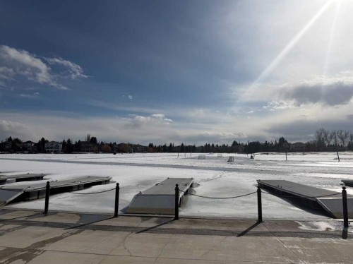 59 Sunlake Close Se, Calgary, AB - Outdoor With Body Of Water With View