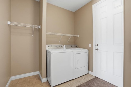 1929 High Park Circle Nw, High River, AB - Indoor Photo Showing Laundry Room