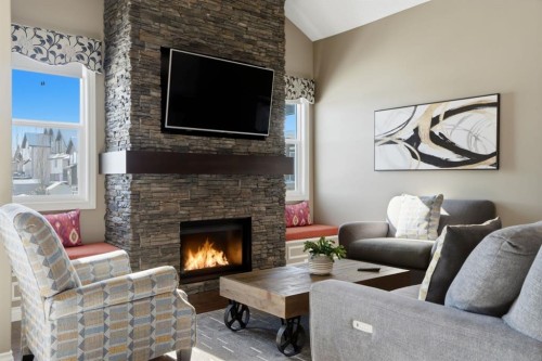 1929 High Park Circle Nw, High River, AB - Indoor Photo Showing Living Room With Fireplace