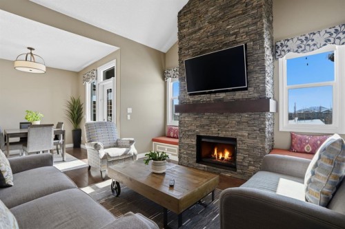 1929 High Park Circle Nw, High River, AB - Indoor Photo Showing Living Room With Fireplace