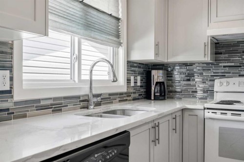 14520 Parkside Drive Se, Calgary, AB - Indoor Photo Showing Kitchen With Double Sink