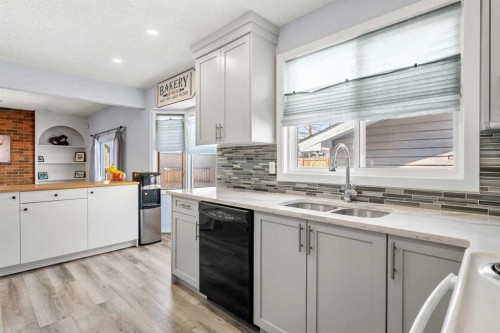 14520 Parkside Drive Se, Calgary, AB - Indoor Photo Showing Kitchen With Double Sink