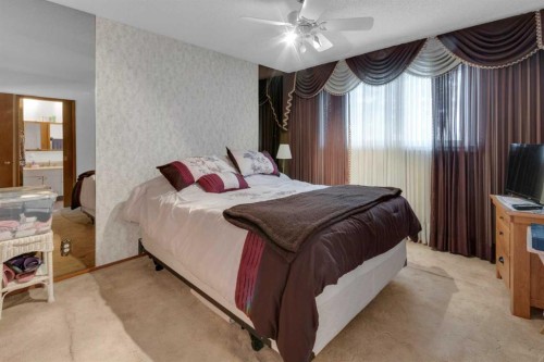 6004 Maddock Drive Ne, Calgary, AB - Indoor Photo Showing Bedroom