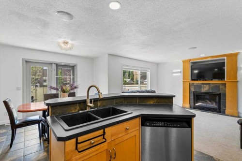 57 Everwillow Boulevard Sw, Calgary, AB - Indoor With Fireplace
