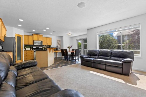 57 Everwillow Boulevard Sw, Calgary, AB - Indoor Photo Showing Living Room