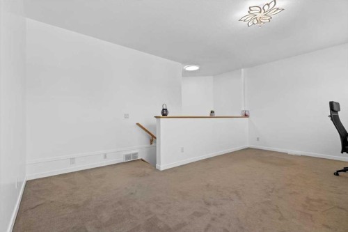 57 Everwillow Boulevard Sw, Calgary, AB - Indoor Photo Showing Other Room