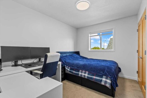 57 Everwillow Boulevard Sw, Calgary, AB - Indoor Photo Showing Bedroom