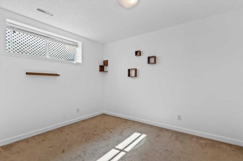 57 Everwillow Boulevard Sw, Calgary, AB - Indoor Photo Showing Other Room