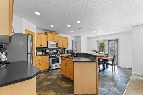 57 Everwillow Boulevard Sw, Calgary, AB - Indoor Photo Showing Kitchen With Stainless Steel Kitchen