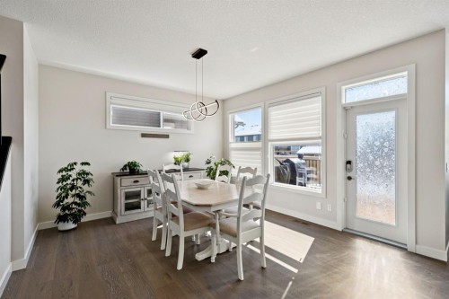 293 Boulder Creek Crescent, Langdon, AB - Indoor Photo Showing Dining Room