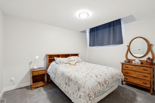 293 Boulder Creek Crescent, Langdon, AB - Indoor Photo Showing Bedroom