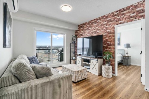 1306-42 Cranbrook Gardens Se, Calgary, AB - Indoor Photo Showing Living Room