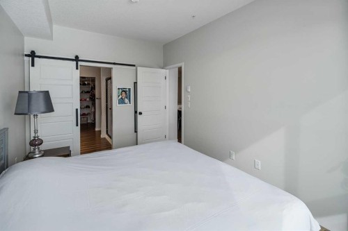 1306-42 Cranbrook Gardens Se, Calgary, AB - Indoor Photo Showing Bedroom