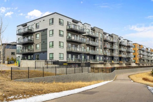 1306-42 Cranbrook Gardens Se, Calgary, AB - Outdoor With Balcony With Facade