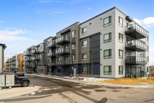 1306-42 Cranbrook Gardens Se, Calgary, AB - Outdoor With Balcony With Facade
